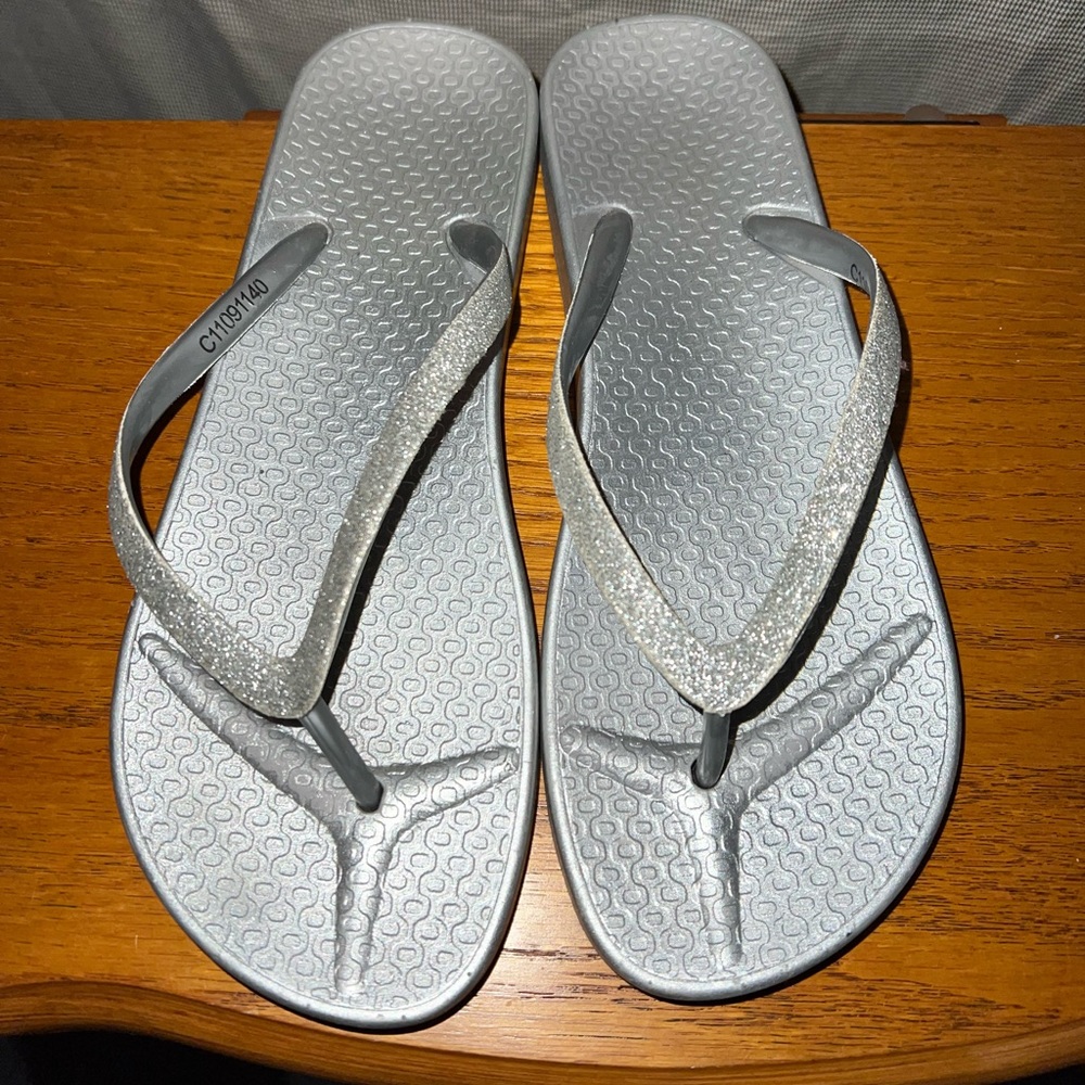 silver flip flops